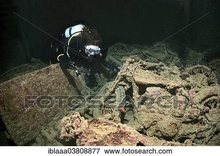 "Scuba diver looking at Norton 16H motorcycle, shipwreck """"SS Thistlegorm"""", Red Sea, Egypt, Africa" View Large Photo Image Stock Photo - "Scuba diver looking at Norton 16H motorcycle, shipwreck """"SS Thistlegorm"""", Red Sea, Egypt, Africa". Fotosearch