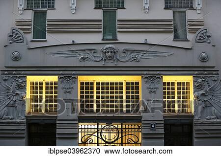 "Sculpture, allegory of the sun and winged lion above the entrance, Art Nouveau facade of the house Alberta iela 4 or Albert Street 4, Lyebedinskiy apartment house, architect Mikhail Eisenstein, Riga, Latvia, Europe" View Large Photo Image Stock Image - "Sculpture, allegory of the sun and winged lion above the entrance, Art Nouveau facade of the house Alberta iela 4 or Albert Street 4, Lyebedinskiy apartment house, architect Mikhail Eisenstein, Riga, Latvia, Europe". Fotosearch
