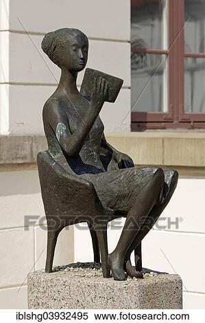 "Sculpture of a reading woman in front of the Eutin State Library, Eutin, Schleswig-Holstein, Germany, Europe" View Large Photo Image Stock Photography - "Sculpture of a reading woman in front of the Eutin State Library, Eutin, Schleswig-Holstein, Germany, Europe". Fotosearch