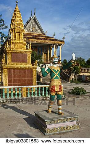 Stock Image - "Sculpture of a temple guardian in the Buddhist monastery of Areyskat near Phnom Penh, Cambodia, Asia". Fotosearch