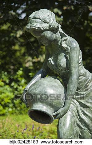 "Sculpture of a woman in the garden of Blomenburg Castle, Selent, Schleswig-Holstein, Germany, Europe" View Large Photo Image Stock Image - "Sculpture of a woman in the garden of Blomenburg Castle, Selent, Schleswig-Holstein, Germany, Europe". Fotosearch
