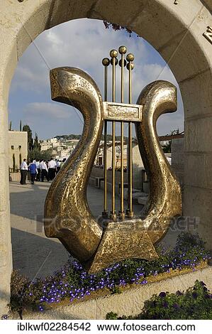 "Sculpture of David's harp at the entrance of the City of David, an excavation site, a group of Jewish visitors and a Palestinian village at the back, East Jerusalem, Jerusalem, Israel, Asia, Middle East, Asia" View Large Photo Image Stock Image - "Sculpture of David's harp at the entrance of the City of David, an excavation site, a group of Jewish visitors and a Palestinian village at the back, East Jerusalem, Jerusalem, Israel, Asia, Middle East, Asia". Fotosearch