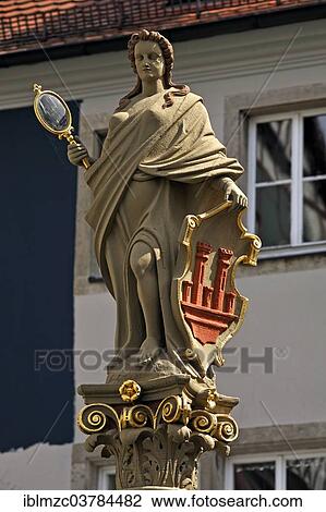 "Sculpture of Minerva, circa 1600, patron goddess of the cities, with the coat of arms of Rothenburg holding a mirror, figure on Seelbrunnen fountain, Rothenburg ob der Tauber, Middle Franconia, Bavaria, Germany, Europe" View Large Photo Image Stock Image - "Sculpture of Minerva, circa 1600, patron goddess of the cities, with the coat of arms of Rothenburg holding a mirror, figure on Seelbrunnen fountain, Rothenburg ob der Tauber, Middle Franconia, Bavaria, Germany, Europe". Fotosearch