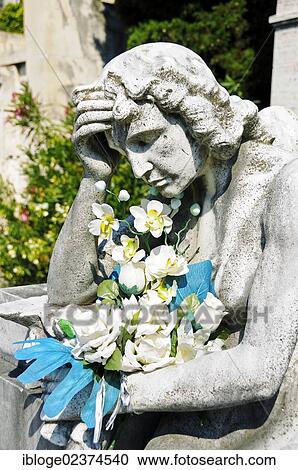 "Sculpture on a grave, historic Staglieno Cemetery, Genoa, Liguria, Italy, Europe" View Large Photo Image Stock Image - "Sculpture on a grave, historic Staglieno Cemetery, Genoa, Liguria, Italy, Europe". Fotosearch