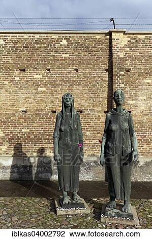 "Sculptures of women in front of the Wall of Nations, Ravensbruck National Memorial, former women's concentration camp, Furstenberg Havel, Brandenburg, Germany, Europe" View Large Photo Image Stock Image - "Sculptures of women in front of the Wall of Nations, Ravensbruck National Memorial, former women's concentration camp, Furstenberg Havel, Brandenburg, Germany, Europe". Fotosearch