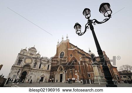 Stock Photograph - "Scuola Grande di San Marco and the church of Santi Giovanni e Paolo, Castello quarter, Venice, Venezia, Veneto, Italy, Europe". Fotosearch