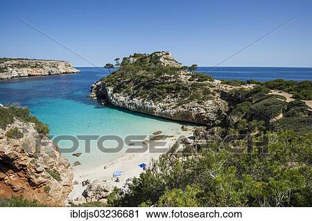"Sea bay with beach and pine, Cala Moro, Santanyi, Majorca, Balearic Islands, Spain, Europe" View Large Photo Image Stock Image - "Sea bay with beach and pine, Cala Moro, Santanyi, Majorca, Balearic Islands, Spain, Europe". Fotosearch