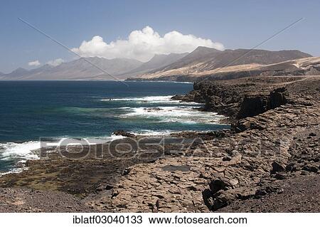 "Sea, coast and rocks, Cofete, Morro Jable, Naturpark Jandia, Fuerteventura, Canary Islands, Spain, Europe" View Large Photo Image Stock Image - "Sea, coast and rocks, Cofete, Morro Jable, Naturpark Jandia, Fuerteventura, Canary Islands, Spain, Europe". Fotosearch