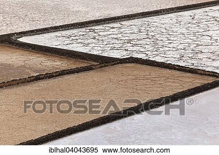 "Sea salt production, dry basins, salt pans, Salinas de Janubio, Lanzarote, Canary Islands, Spain, Europe" View Large Photo Image Stock Photography - "Sea salt production, dry basins, salt pans, Salinas de Janubio, Lanzarote, Canary Islands, Spain, Europe". Fotosearch