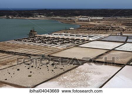 "Sea salt production, salt pans, Salinas de Janubio, Lanzarote, Canary Islands, Spain, Europe" View Large Photo Image Stock Photo - "Sea salt production, salt pans, Salinas de Janubio, Lanzarote, Canary Islands, Spain, Europe". Fotosearch
