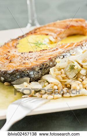 "Seafood meal with fried salmon, bulgur, fennel and aioli" View Large Photo Image Stock Photo - "Seafood meal with fried salmon, bulgur, fennel and aioli". Fotosearch