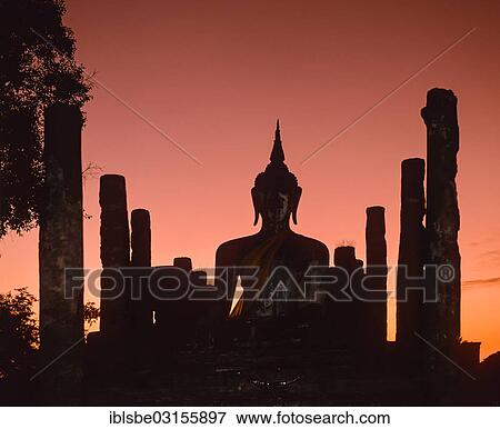 "Seated Buddha at Wat Mahathat, silhouette at dusk, Sukhothai Historical Park, Sukhothai, Sukhothai Province, Northern Thailand, Thailand, Asia" View Large Photo Image Stock Photo - "Seated Buddha at Wat Mahathat, silhouette at dusk, Sukhothai Historical Park, Sukhothai, Sukhothai Province, Northern Thailand, Thailand, Asia". Fotosearch