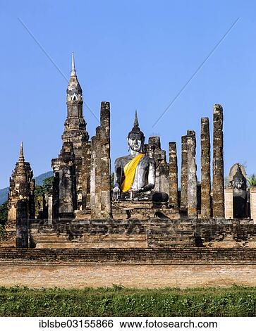 Stock Photograph - "Seated Buddha at Wat Mahathat, temple ruins, pillars, chedi, Sukhothai Historical Park, Sukhothai, Sukhothai Province, Northern Thailand, Thailand, Asia". Fotosearch