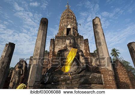 "Seated Buddha statue in front of a chedi, temple complex of Wat Phra Si Rattana Mahathat Chaliang, Si Satchanalai Historical Park, UNESCO World Heritage Site, Si Satchanalai, Sukhothai Province, Northern Thailand, Thailand, Asia" View Large Photo Image Stock Photo - "Seated Buddha statue in front of a chedi, temple complex of Wat Phra Si Rattana Mahathat Chaliang, Si Satchanalai Historical Park, UNESCO World Heritage Site, Si Satchanalai, Sukhothai Province, Northern Thailand, Thailand, Asia". Fotosearch