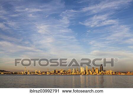 Stock Image - "Seattle skyline in the evening sun, Seattle, Washington, United States, North America". Fotosearch