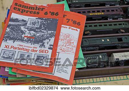 "Second hand magazines and toy trains for sale at the weekly flea market, Dresden, Saxony, Germany, Europe" View Large Photo Image Picture - "Second hand magazines and toy trains for sale at the weekly flea market, Dresden, Saxony, Germany, Europe". Fotosearch