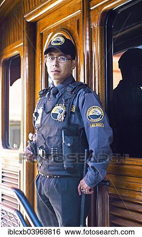 "Security officer in a carriage of the Andean railway Nariz del Diablo, Chimborazo Province, Ecuador, South America" View Large Photo Image Stock Photograph - "Security officer in a carriage of the Andean railway Nariz del Diablo, Chimborazo Province, Ecuador, South America". Fotosearch