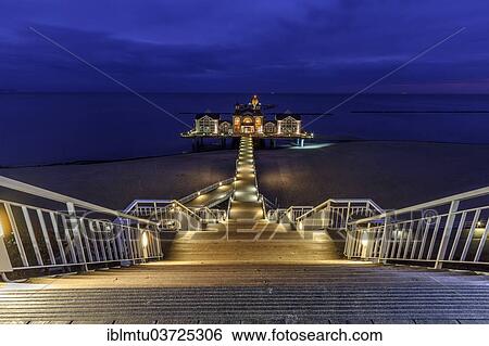 Stock Photograph - "Seebruecke Sellin, pier, dusk, Baltic Seaside Resort Sellin, Rugen, Mecklenburg-Western Pomerania, Germany, Europe". Fotosearch
