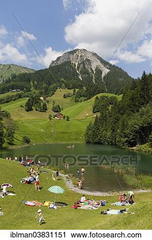 "Seewaldsee lake near Fontanella, in front of Blasenka Mountain, Grosses Walsertal Biosphere Reserve, Vorarlberg, Austria, Europe" View Large Photo Image Stock Image - "Seewaldsee lake near Fontanella, in front of Blasenka Mountain, Grosses Walsertal Biosphere Reserve, Vorarlberg, Austria, Europe". Fotosearch