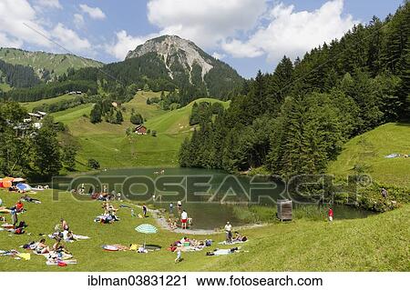 "Seewaldsee lake near Fontanella, in front of Blasenka Mountain, Grosses Walsertal Biosphere Reserve, Vorarlberg, Austria, Europe" View Large Photo Image Stock Image - "Seewaldsee lake near Fontanella, in front of Blasenka Mountain, Grosses Walsertal Biosphere Reserve, Vorarlberg, Austria, Europe". Fotosearch