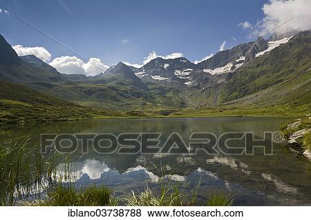 "Seewer Lake, Grosses Horn, Imstspitze, First Flush and High First mountains, Timmelsjoch, Seewertal valley, South Tyrol province, Trentino-Alto Adige, Italy, Europe" View Large Photo Image Stock Photo - "Seewer Lake, Grosses Horn, Imstspitze, First Flush and High First mountains, Timmelsjoch, Seewertal valley, South Tyrol province, Trentino-Alto Adige, Italy, Europe". Fotosearch
