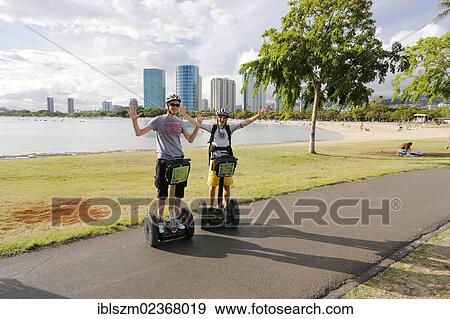 Stock Photo - "Segway riders on the beach at Waikiki, Honolulu, O'ahu, Hawai'i, USA, America". Fotosearch