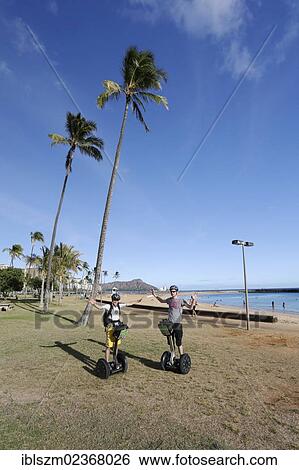 "Segway riders on the beach at Waikiki, Honolulu, O'ahu, Hawai'i, USA, America" View Large Photo Image Stock Photograph - "Segway riders on the beach at Waikiki, Honolulu, O'ahu, Hawai'i, USA, America". Fotosearch