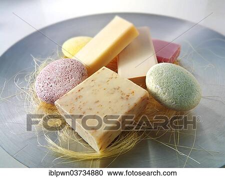 Selection of natural hand made soap bars piled on a dish View Large Photo Image Stock Image - Selection of natural hand made soap bars piled on a dish. Fotosearch