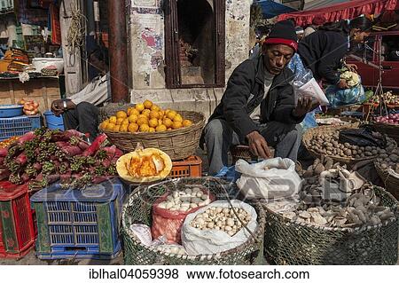 "Selling vegetables in the street, vegetable seller, old town, Kathmandu, Nepal, Asia" View Large Photo Image Stock Photo - "Selling vegetables in the street, vegetable seller, old town, Kathmandu, Nepal, Asia". Fotosearch