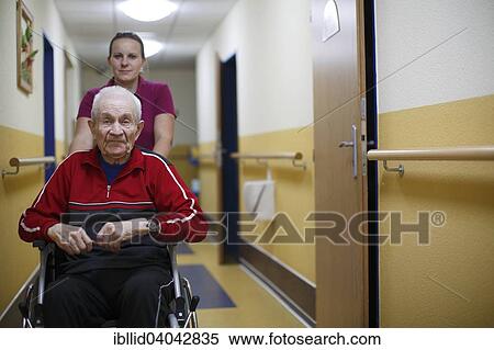 Stock Photography - "Senior citizen, 87 years, wheelchair, nurse for the elderly, nursing home". Fotosearch