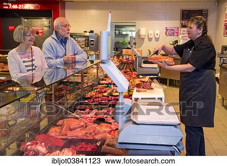 "Senior couple shopping at the meat counter in the supermarket, Germany, Europe" View Large Photo Image Stock Image - "Senior couple shopping at the meat counter in the supermarket, Germany, Europe". Fotosearch