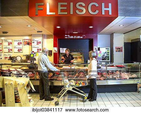 "Senior couple shopping at the meat counter in the supermarket, Germany, Europe" View Large Photo Image Stock Photo - "Senior couple shopping at the meat counter in the supermarket, Germany, Europe". Fotosearch