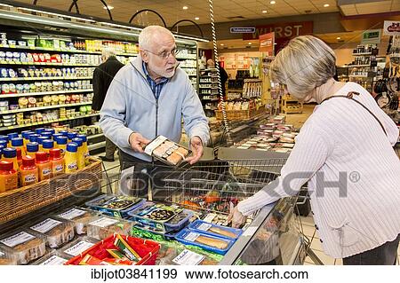 "Senior couple shopping in supermarket, Germany, Europe" View Large Photo Image Stock Photo - "Senior couple shopping in supermarket, Germany, Europe". Fotosearch