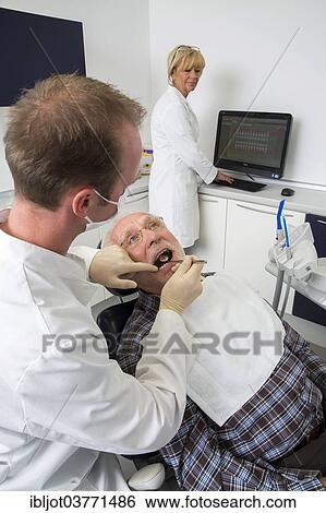 "Senior man at the dentist, Germany, Europe" View Large Photo Image Stock Photograph - "Senior man at the dentist, Germany, Europe". Fotosearch
