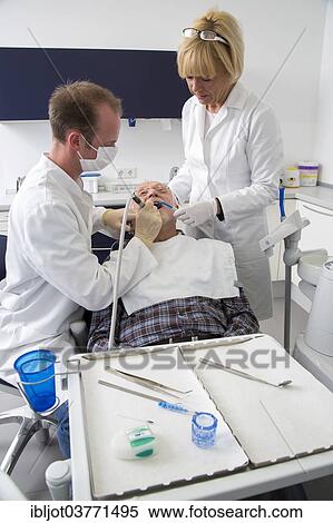 "Senior man receiving treatment at the dentist, Germany, Europe" View Large Photo Image Stock Photography - "Senior man receiving treatment at the dentist, Germany, Europe". Fotosearch