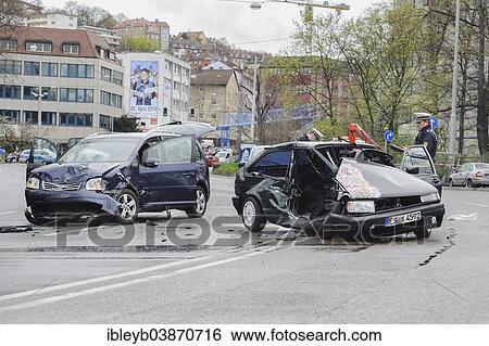 "Serious accident, a VW Polo and a VW Touran collided in oncoming traffic, car wrecks in the street, B14 road at Neckartor, Stuttgart, Baden-Wurttemberg, Germany, Europe" View Large Photo Image Stock Photograph - "Serious accident, a VW Polo and a VW Touran collided in oncoming traffic, car wrecks in the street, B14 road at Neckartor, Stuttgart, Baden-Wurttemberg, Germany, Europe". Fotosearch