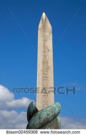 "Serpentine Column with the Obelisk at the back, Dikilitas, Egyptian hieroglyphs, Istanbul, Turkey, Asia" View Large Photo Image Stock Photo - "Serpentine Column with the Obelisk at the back, Dikilitas, Egyptian hieroglyphs, Istanbul, Turkey, Asia". Fotosearch
