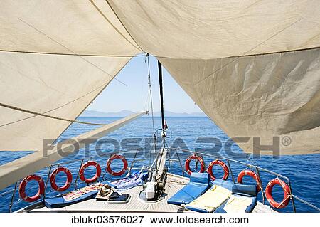 "Set sail and life rings on a cruise ship in the Turkish Aegean Sea, Fethiye, Mugla Province, Aegean region, Turkey, Asia" View Large Photo Image Stock Photo - "Set sail and life rings on a cruise ship in the Turkish Aegean Sea, Fethiye, Mugla Province, Aegean region, Turkey, Asia". Fotosearch