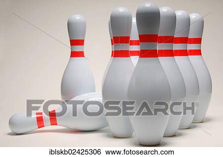 Set up bowling pins with one fallen over View Large Photo Image Stock Photograph - Set up bowling pins with one fallen over. Fotosearch