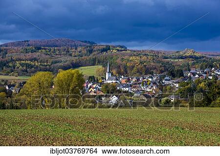 "Settlement with the Parish Church of St. Peter, Westerwald, Niederzeuzheim, Hadamar, Hesse, Germany, Europe" View Large Photo Image Picture - "Settlement with the Parish Church of St. Peter, Westerwald, Niederzeuzheim, Hadamar, Hesse, Germany, Europe". Fotosearch