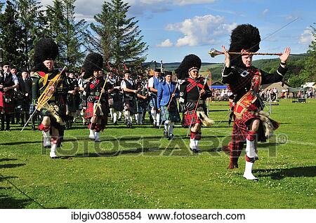 "Several pipe majors leading a pipe band on the sports ground at the Highland Games, Dufftown, Moray, Highlands, Scotland, United Kingdom, Europe" View Large Photo Image Picture - "Several pipe majors leading a pipe band on the sports ground at the Highland Games, Dufftown, Moray, Highlands, Scotland, United Kingdom, Europe". Fotosearch