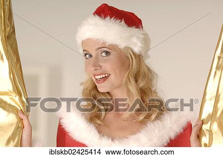 Picture - "Sexy Miss Santa, portrait". Fotosearch
