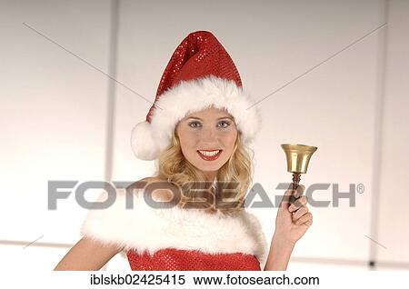 Sexy Miss Santa ringing a golden bell View Large Photo Image Stock Photography - Sexy Miss Santa ringing a golden bell. Fotosearch