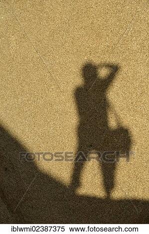 "Shadow of a photographer on a monzogranite rock formation, Hidden Valley, Joshua Tree National Park, Mojave Desert, California, Southwest, United States of America, USA" View Large Photo Image Stock Photography - "Shadow of a photographer on a monzogranite rock formation, Hidden Valley, Joshua Tree National Park, Mojave Desert, California, Southwest, United States of America, USA". Fotosearch