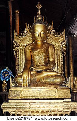 Picture - "Shan-style Buddha statue at the Nga Phe Kyaung monastery, Jumping Cat Monastery, Lake Inle, Burma also known as Myanmar, Southeast Asia, Asia". Fotosearch