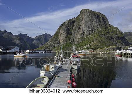 Stock Image - "Sheltered harbour and high mountains, Lofoten, Hamnoya, Nordland, Norway, Europe". Fotosearch