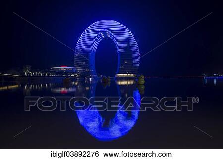 Stock Photograph - "Sheraton Hot Spring Resort, at night with blue lighting, light show, Huzhou, Zhejiang, China, Asia". Fotosearch