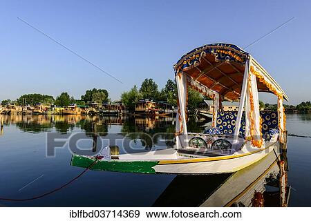 "Shikara boat on Dal Lake, houseboats at the back, Srinagar, Jammu and Kashmir, India, Asia" View Large Photo Image Stock Photo - "Shikara boat on Dal Lake, houseboats at the back, Srinagar, Jammu and Kashmir, India, Asia". Fotosearch
