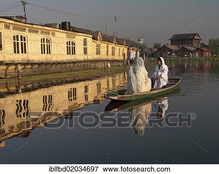 "Shikara, traditional boat on Dal Lake, Srinagar, Jammu and Kashmir, India, Asia" View Large Photo Image Stock Photo - "Shikara, traditional boat on Dal Lake, Srinagar, Jammu and Kashmir, India, Asia". Fotosearch