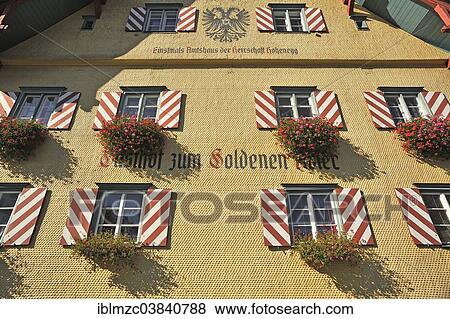 "Shingle facade with windows and flower boxes, of the restaurant """"Zum Golden Adler"""", Weitnau, Oberallgau, Allgau, Bavaria, Germany, Europe" View Large Photo Image Stock Photo - "Shingle facade with windows and flower boxes, of the restaurant """"Zum Golden Adler"""", Weitnau, Oberallgau, Allgau, Bavaria, Germany, Europe". Fotosearch